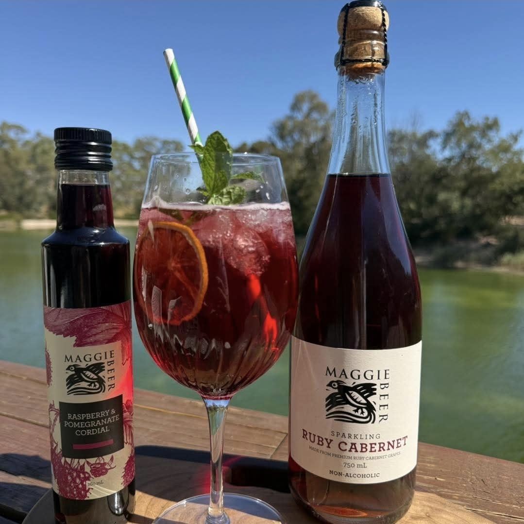 Maggie Beer Sparkling Ruby Cabernet cocktail on a riverside deck in the Barossa